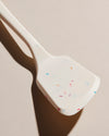 Close up of the GIR Sprinkle Flip on a cream background. 