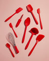 The GIR Red 10 Piece Best Seller Set on a peach background. 