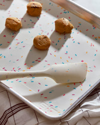 Close up view of the 3 Piece Baking set in Sprinkles with small biscuits on the tray.  