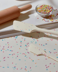 Close up view of the 3 Piece Baking set in Sprinkles on a kitchen counter top. 