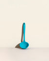 GIR Ultimate Ladle in Teal on a cream background.