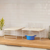 The Open Spaces Shelf Risers on a kitchen counter top. 