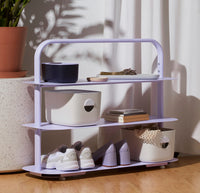 The Open Spaces Lavender Entryway Rack with items displayed on it.