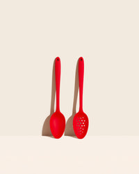 GIR Ultimate and Perforated Spoon set on a cream background.