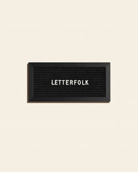 Letterfolk Mini Midnight Letter Board on a cream background.
