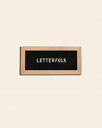 Letterfolk Mini Oak Letter Board on a cream background.