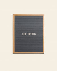 Letterfolk Writer Letter Board in Grey on a cream background.