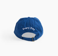 The back on the Art Every Day Cap in Cobalt on a white background. 