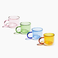 Different colored Double Wall Mug lined up on a white background. 
