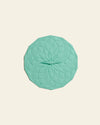 GIR Suction Lid in Seafoam on a cream background.