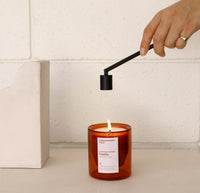 The Yield Candle Snuffer being used on a Castillo Candle. 